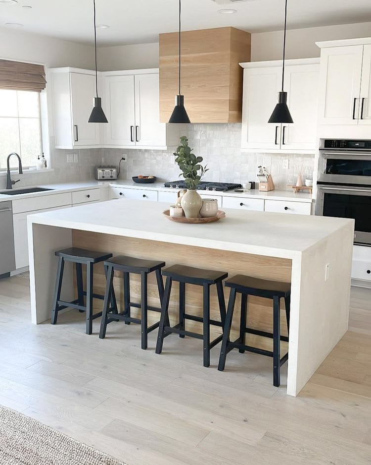 Kitchen with a timber slat ceiling feature and white island